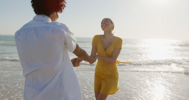 Joyful Couple Playing on Beach at Sunset - Download Free Stock Images Pikwizard.com