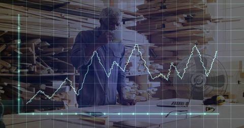 Carpenter Devising Plans with Analytics Overlay in Workshop