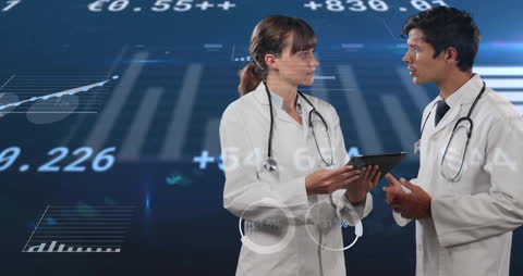 Doctors Analyzing Data with Technology in Medical Finance