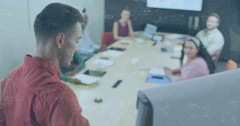 Innovative business meeting with data analytics overlay