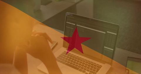 programmer analyzing code on laptop with subtle flag overlay - Download Free Stock Images Pikwizard.com
