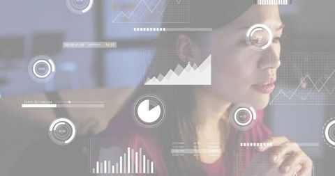 Mid-adult chinese woman gazing at hud data overlays, studying analytics at home