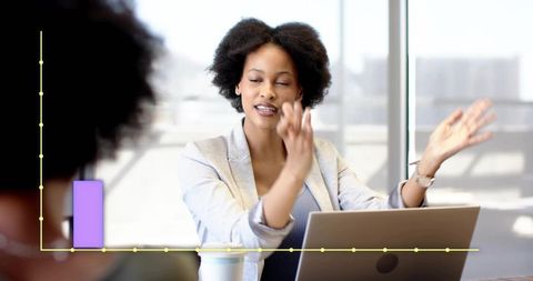 Confident woman leading business presentation with laptop, coffee and infographic overlay