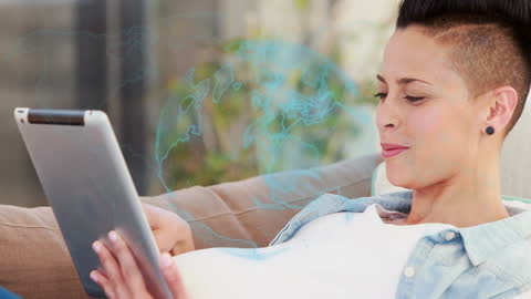 Smiling Woman Using Tablet with Digital Globe Overlay