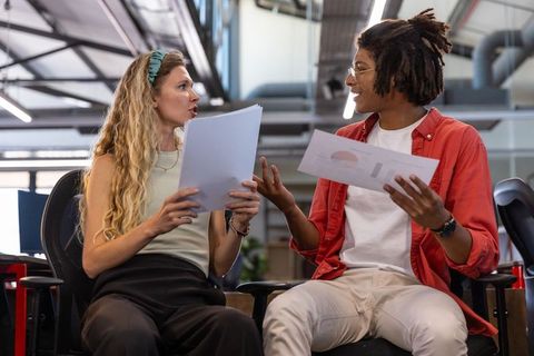 Collaborative Team Discussion in Modern Office Workspace