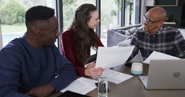 Smiling Multiracial Team Collaborating in Modern Office Space - Download Free Stock Images Pikwizard.com