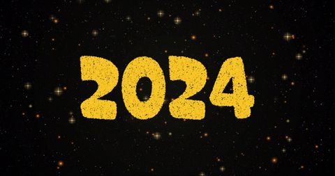 Golden 2024 text with festive fireworks on black background