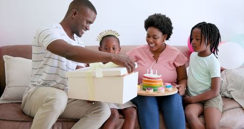 African American Family Celebrating Birthday at Home with Joy and Smiles