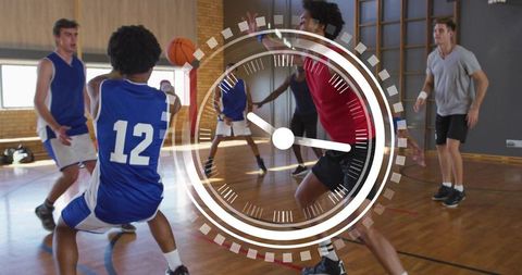 Youth basketball defense intensity with clock overlay emphasizing game time pressure focus