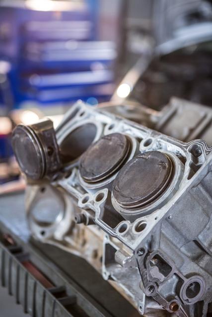 Close-up of car engine at repair garage