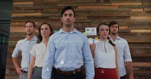 Business Professionals Analyzing Financial Graphics Together