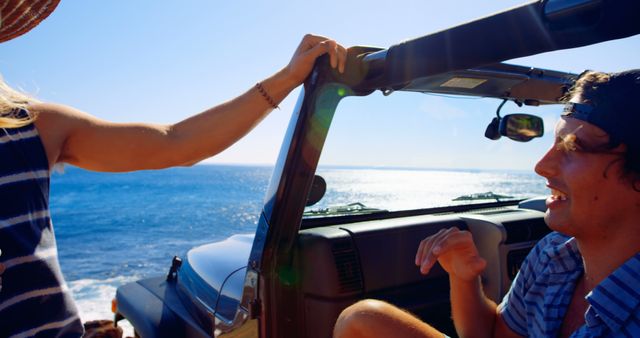 Friends Enjoying Coastal Drive in Convertible Jeep on a Sunny Day - Download Free Stock Images Pikwizard.com