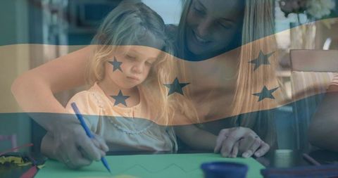 Mother bonding with child through creative learning activity