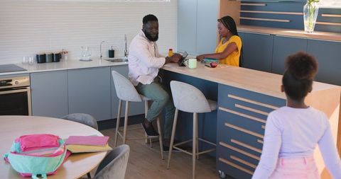 Modern African American Couple Enjoying Quality Time in Kitchen
