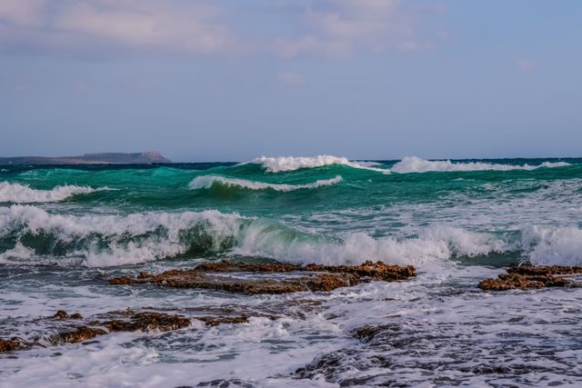 Rough waves crashing on rocky shore of Mediterranean Sea - Download Free Stock Photos Pikwizard.com