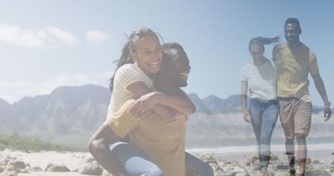 Playful African American Couple Enjoying Romantic Beach Day
