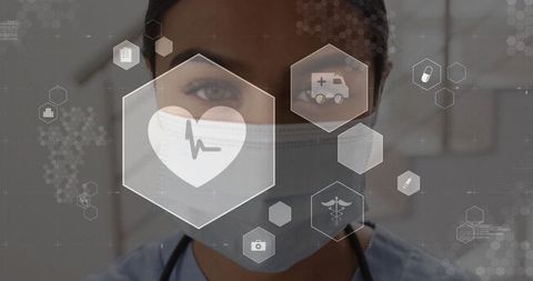 Masked clinician wearing scrubs facing camera with telemedicine hex interface and ecg