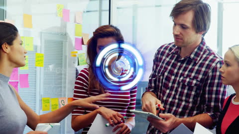 Creative Business Team Collaborating in Office with Digital Interface