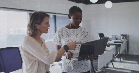 Diverse Business Team Analyzing Digital Financial Data on Laptop - Download Free Stock Images Pikwizard.com