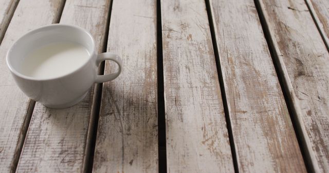 Image of cup of fresh milk on wooden background - Download Free Stock Photos Pikwizard.com