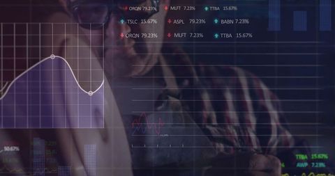 Analyst observing stock trends through high-tech holographic screen