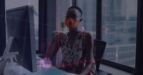 Office Professional Wearing Face Mask at Workstation in Urban Setting