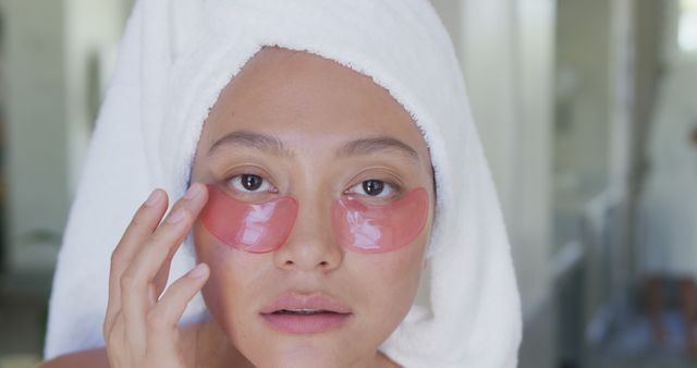 Woman Applying Eye Patches for Skincare in Bathroom - Download Free Stock Images Pikwizard.com