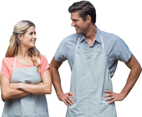 smiling couple in matching aprons in transparent setting - Download Free Stock Videos Pikwizard.com