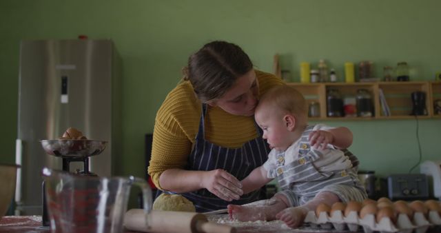 Mother Guiding Baby in Kitchen Baking Activity - Download Free Stock Images Pikwizard.com