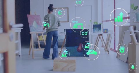 Modern Artist in Studio with Digital Sustainability Icons