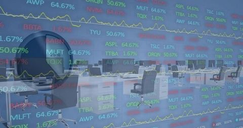 Office Desktop with Digital Stock Market Displays on Monitor