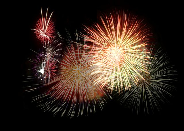 Bright Colorful Fireworks Exploding Against Night Sky - Download Free Stock Photos Pikwizard.com