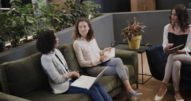 Diverse Women Collaborating in Modern Office Lounge - Download Free Stock Images Pikwizard.com