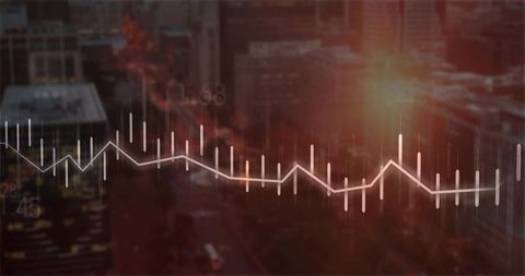 Financial Candlestick Graph Overlay on Cityscape at Twilight