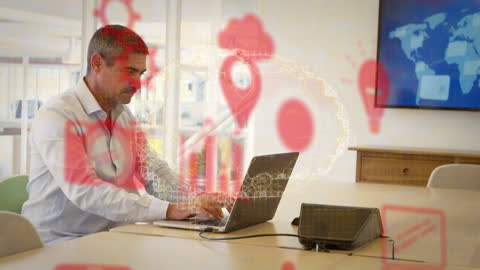 Man Using Laptop in Office with Digital Icons Overlay