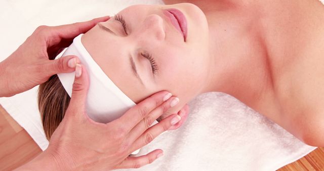 Woman Relaxing During Professional Facial Massage Therapy Session - Download Free Stock Images Pikwizard.com