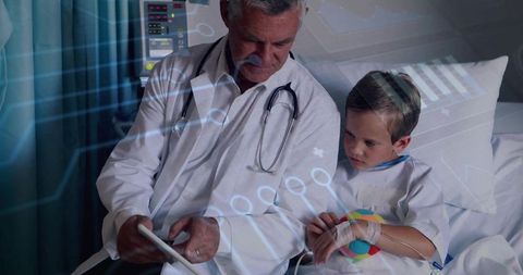 Doctor Consulting with Young Patient in Hospital Room