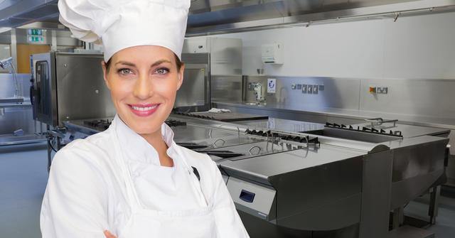 Digital composite image of female chef standing with arms crossed in commercial kitchen