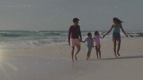 Joyful Family Walking Together on Sunlit Summer Beach