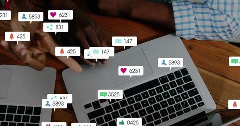 Pointing hand guiding partner on laptop with floating social notifications and analytics