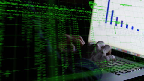 Hands on Laptop with Digital Data Overlay Hints Cybersecurity