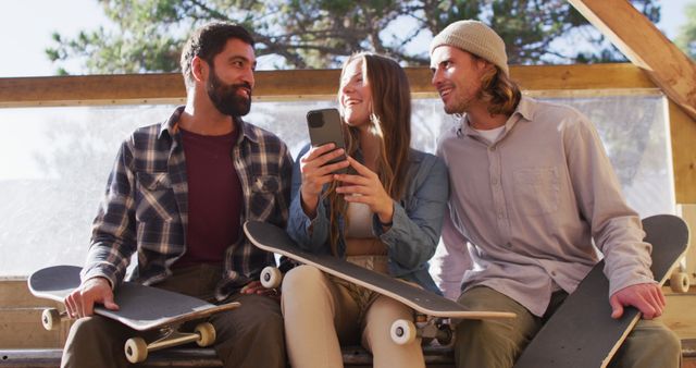 Group of Friends Enjoying Skateboarding Break Together - Download Free Stock Images Pikwizard.com