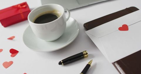 Romantic Workspace with Coffee and Love Letters