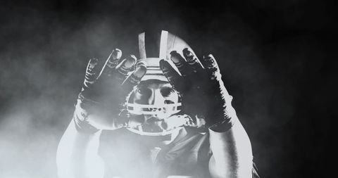 American Football Player in Impressive Smoke Cloud - Download Free Stock Images Pikwizard.com