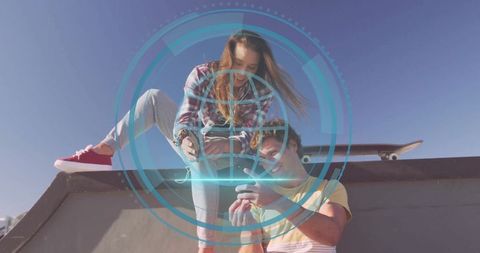 Youthful Skaters Exploring Innovative Technology on Ramp