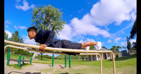 Man Exercising Outdoors Doing Push-Ups on Sunny Day - Download Free Stock Images Pikwizard.com