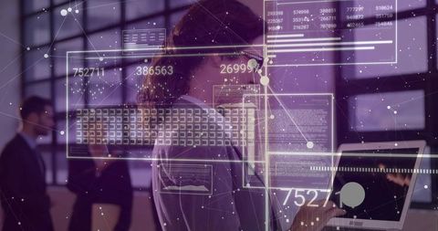 Female Analyst Interacting with Augmented Data HUD While Collaborating in Office