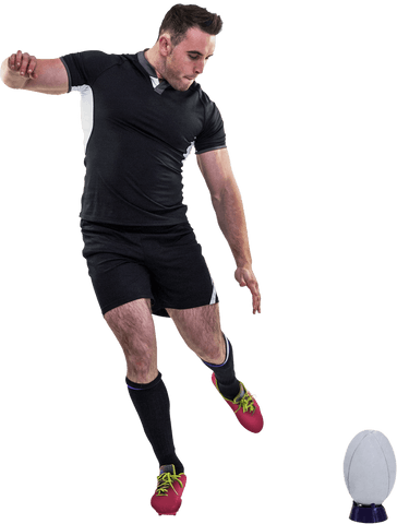 Rugby player kicking ball in transparent background