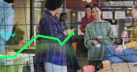 Team Collaborating in Modern Open Office with Green Growth Chart Overlay for Brainstorming