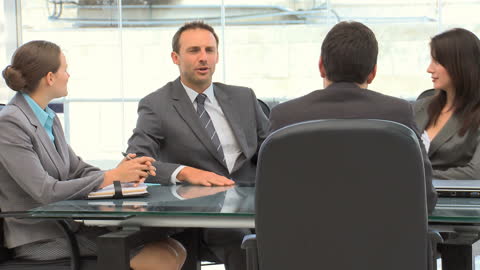 Dynamic Business Meeting in Modern Office Setting